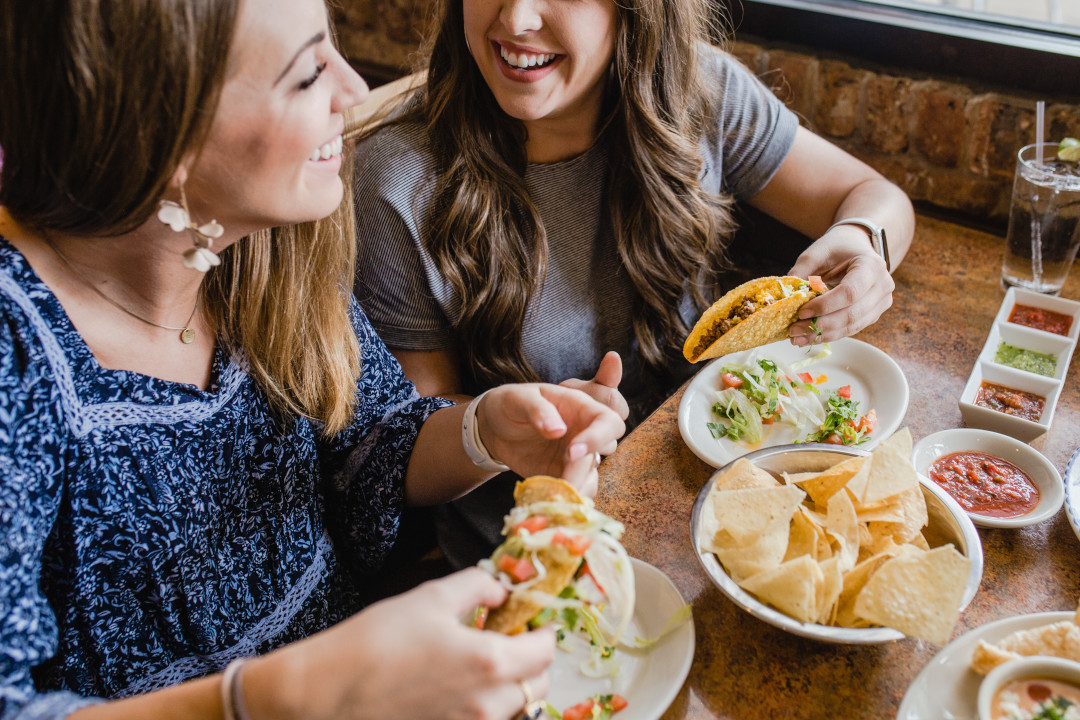 Guests enjoying tacos at Abuelo's